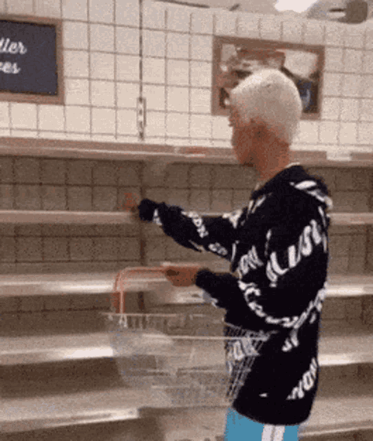 a man wearing a hoodie that says ' lust ' on it