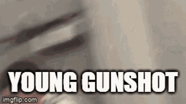 a close up of a person 's face with the words young gunshot
