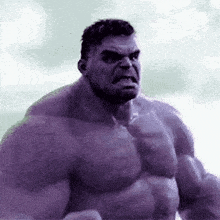 a close up of a purple hulk with a very angry face .