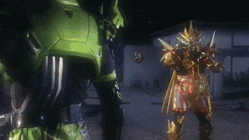 a green robot and a gold robot are standing in front of a building