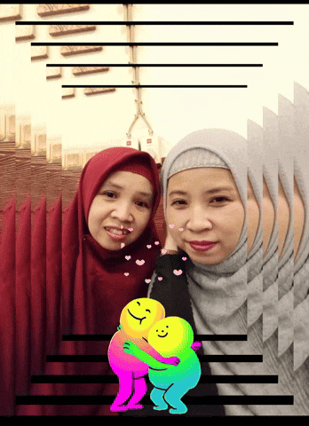 two women are hugging each other with a colorful smiley face between them