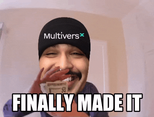 a man wearing a hat that says multivers is holding a dollar bill