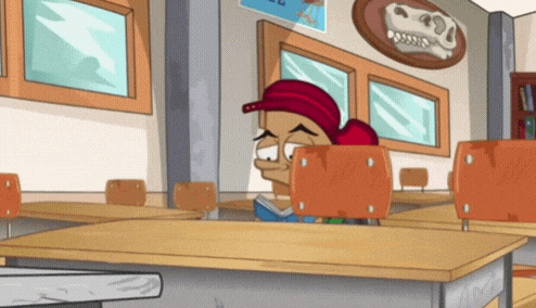 a cartoon character is sitting at a desk in a classroom with a sign on the wall that says ' a '