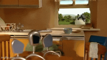 a kitchen with a window and a bowl of food on the counter ..