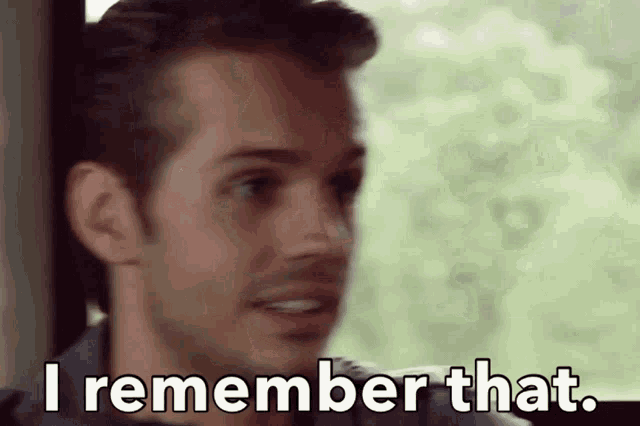 a man is saying i remember that while looking out a window