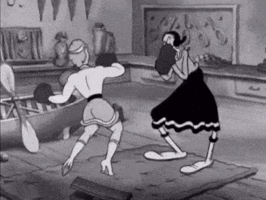 a black and white cartoon shows a man and woman boxing
