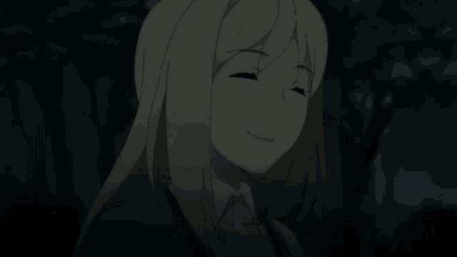 a girl with blonde hair is smiling and looking up