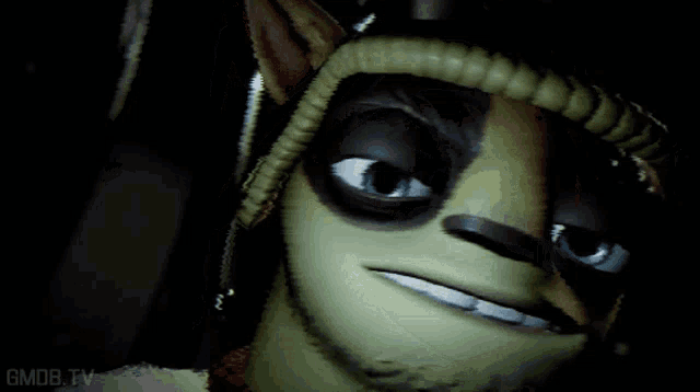 a close up of a cartoon character with the words gmob.tv below