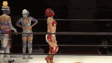 a woman in a wrestling ring with the hashtag #pw_mg on the bottom right