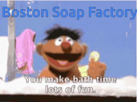 an advertisement for boston soap factory shows ernie holding a towel