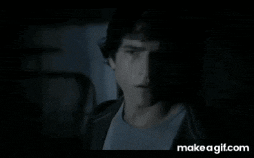 a person is walking down a set of stairs in a dark room with the website makeagif.com at the bottom