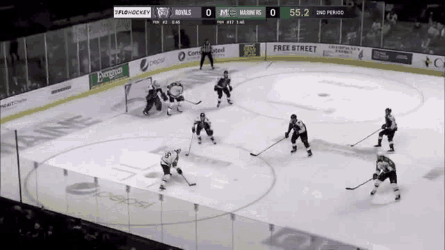 a hockey game is being played between the royals and the mariner 's