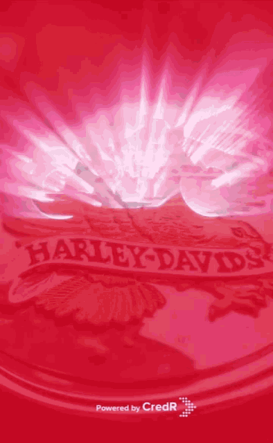 a harley davidson logo is displayed on a pink background