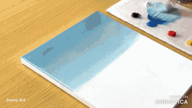 a blue and white piece of paper with the words joany art on it