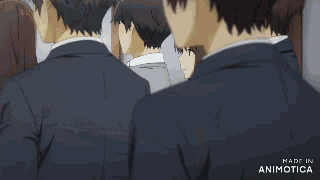 a group of people standing in a hallway with the words made in animatica on the bottom