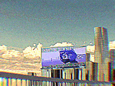 a billboard that says have you seen her on top of a building