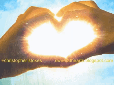 a person making a heart shape with their hands with the website sweethearts.blogspot.com in the corner