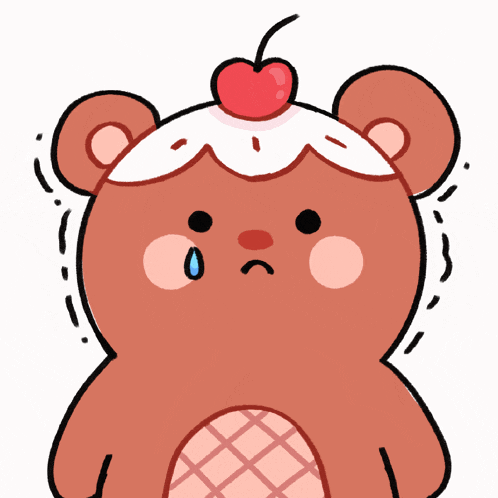 a brown teddy bear with a cherry on top of it 's head