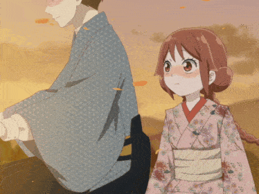 a girl in a kimono stands next to a man in a blue kimono