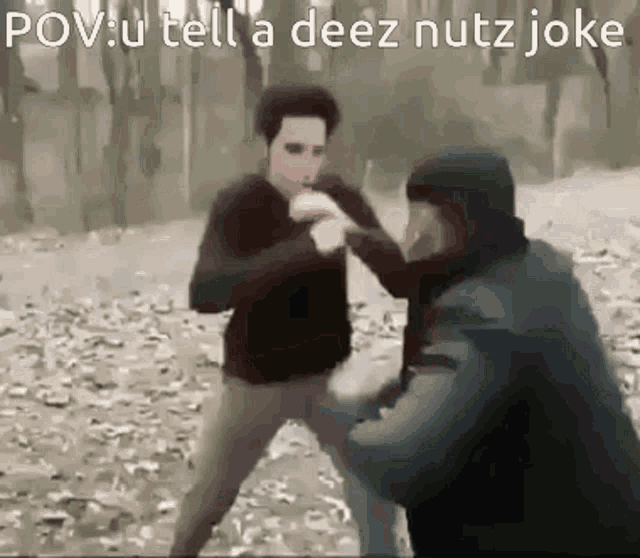 two men are fighting in the woods and the caption says pov u tell a deez nuts joke