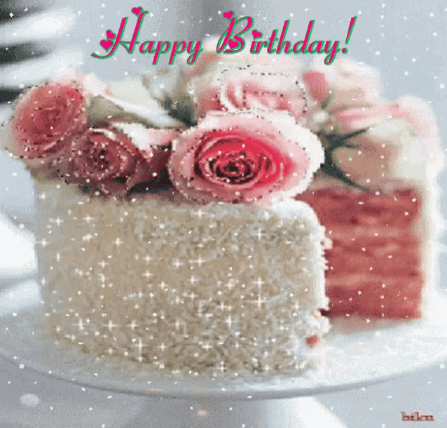 a birthday cake with pink roses on it and the words happy birthday