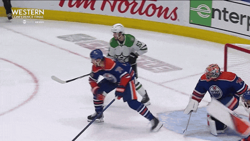 a hockey game is being shown on the western conference final channel