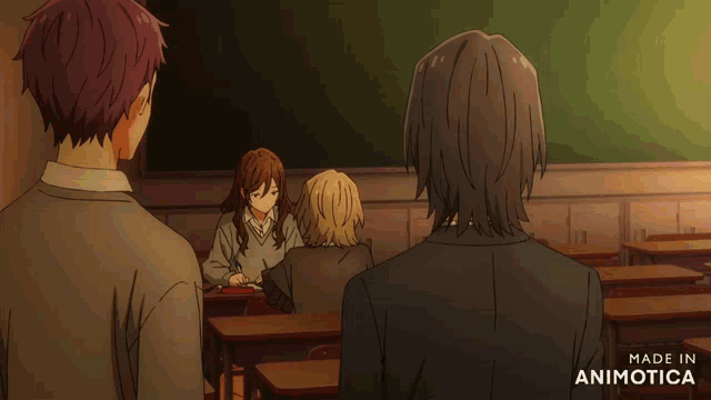a couple of anime characters standing next to each other with the words made in animotica on the bottom right