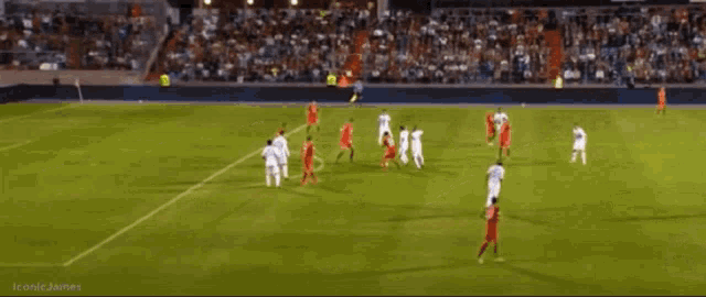 soccer players on a field with sbobet advertisements