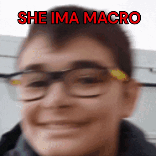 a close up of a person with glasses and the words she ima macro