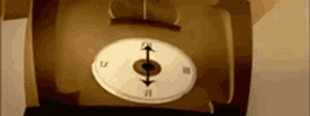 a close up of a clock with roman numerals and arrows pointing in opposite directions .