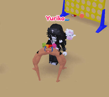 a video game character named yuriko is holding a man 's head