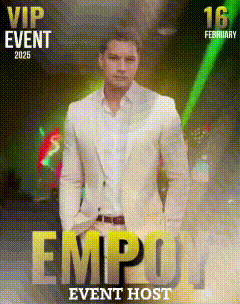 a man in a white suit is standing in front of a sign that says empoy