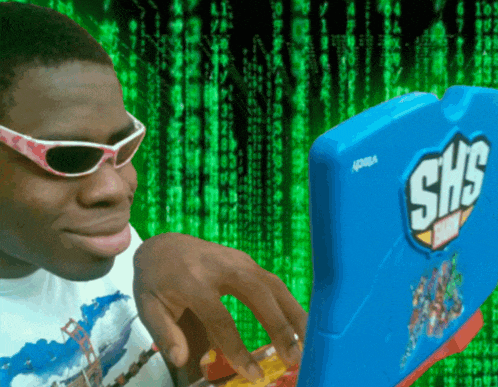 a man wearing sunglasses looks at a shs item