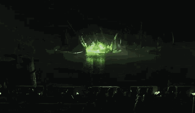 a painting of jesus wearing a crown is projected on a screen