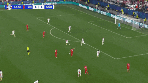 a soccer game is being played with a score of 1 to 1