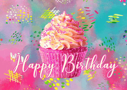a pink cupcake with pink frosting and sprinkles and the words happy birthday