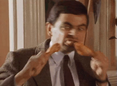 Mr Bean Rowan Atkinson GIF - Mr Bean Rowan Atkinson Eat GIFs
