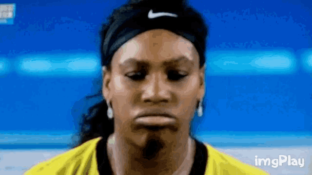 a close up of a woman 's face with the words imgplay visible