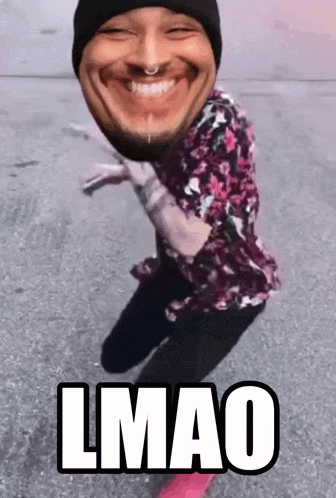 a man in a floral shirt is making a funny face and the word lmao is above him