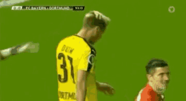 a soccer player wearing a yellow jersey with the number 37 on the back
