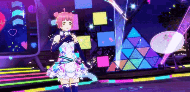 a girl with pink hair is standing on a stage in front of a colorful background