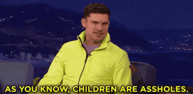 a man in a neon yellow jacket is sitting in a chair and saying `` as you know , children are assholes '' .