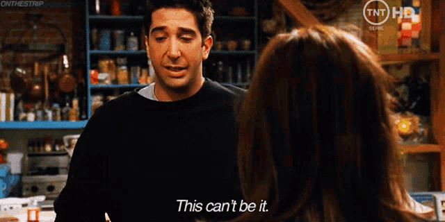 a man in a black sweater says this can 't be it in front of a woman