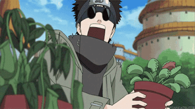 a cartoon character is holding a potted plant with fangs