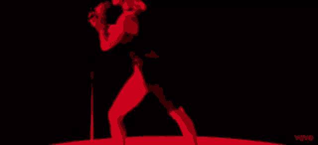 a close up of a woman 's face with the word vevo on the bottom right