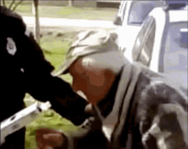 a police officer is talking to an older man