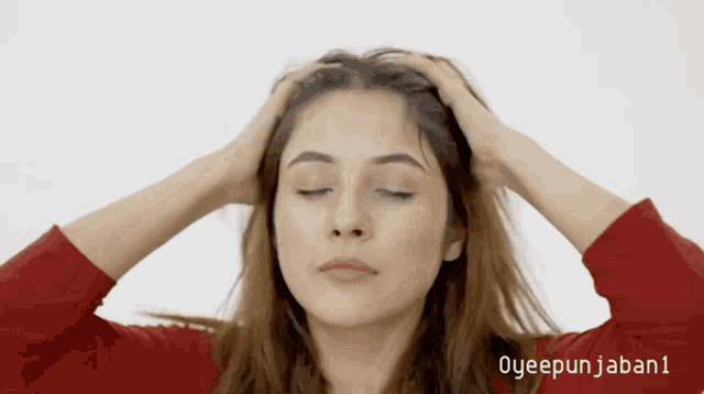 a woman with her eyes closed holds her hands to her head with the words oyeepunjaban1 written below her