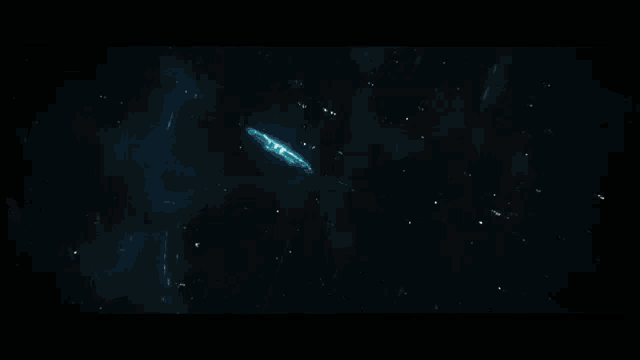 a man in a space suit is holding a glowing object