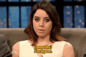 a woman is sitting on a couch with a caption that says " mouths fuck you "
