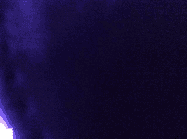 a dark blue background with a white light coming out of the corner
